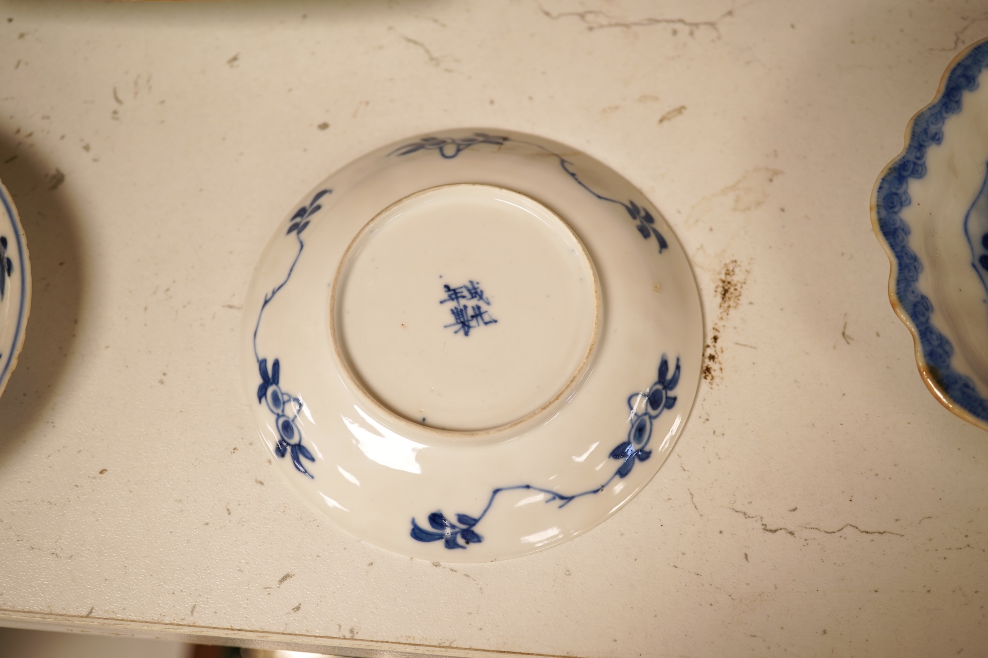 A Chinese export blue and white blue plate, sauceboat and Ko-sometsuke type dish together with a miniature tea bowl and two saucers. Plate 22cm diameter